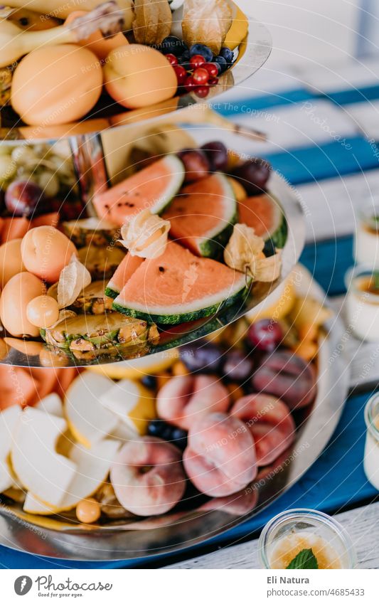 Colorful fruit on etagere at wedding buffet Etagere Buffet Delicious Food Fruit Fresh Nutrition Organic produce Vegetarian diet Food photograph cute Fruity