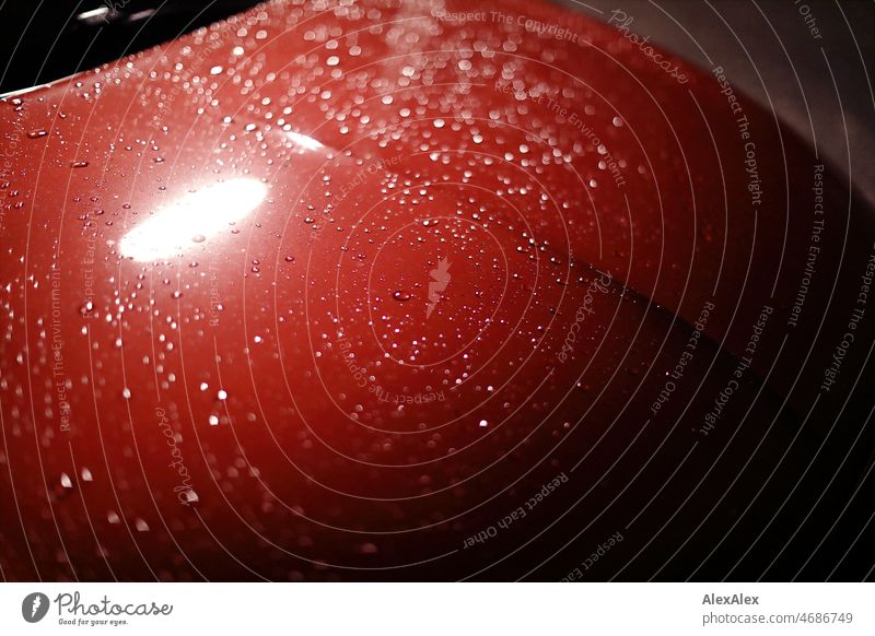 Rain wet, red car hood at night in the dark with reflection of a lantern Wet rainwater raindrops Water Drops of water Tin Red Damp Dark Night palatinate chill