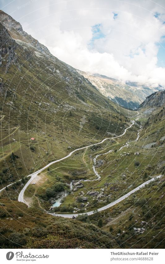 Road in a valley Valley Street Brook Rock Mountain Alps valais