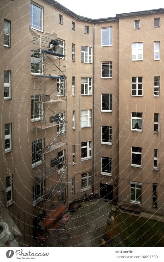 Scaffolding in backyard Old building work on the outside construction Facade Window House (Residential Structure) Sky rear building Backyard Courtyard