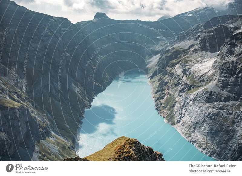 Lake in front of mountain panorama Reservoir Alps Mountain Landscape Nature Water Exterior shot Vantage point Panorama (View) Hiking Glarus limmernsee Blue Rock