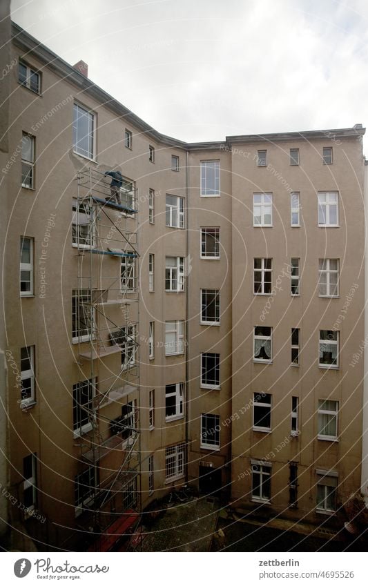 Scaffolding in backyard Old building work on the outside construction Facade Window House (Residential Structure) Sky rear building Backyard Courtyard