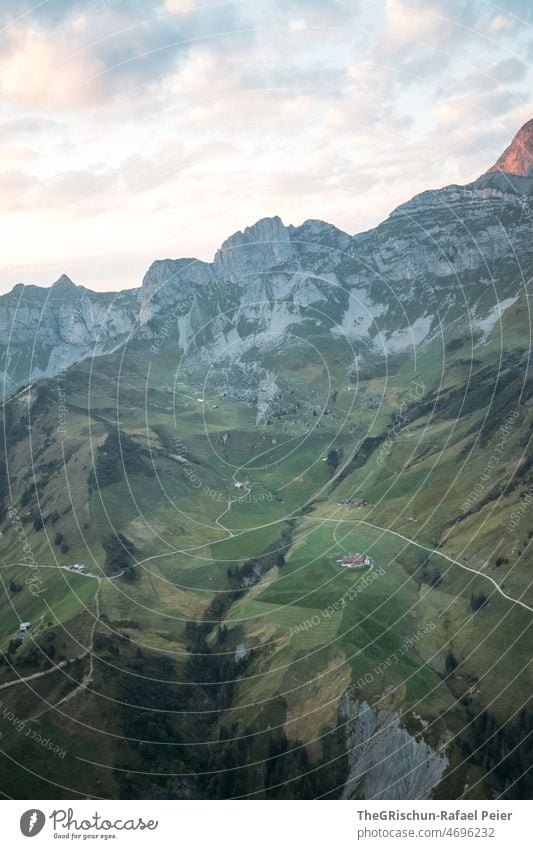 Sunset in the mountains Vantage point Moody Alps Mountain Panorama (View) Nature Clouds Sky Landscape Evening Green sunny from on high