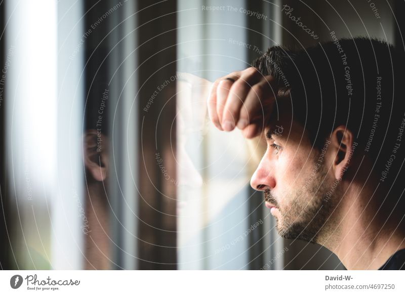 sad look through window - man in mind Meditative Man empty gaze Expression Listlessness unmotivated Thoughtless lost in thought Window reflection Hopelessness