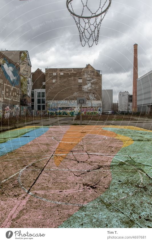 a basketball court on a backyard in Berlin Basketball Playground Winter Backyard Graffiti Sports Playing Exterior shot Ground Colour photo Downtown Berlin