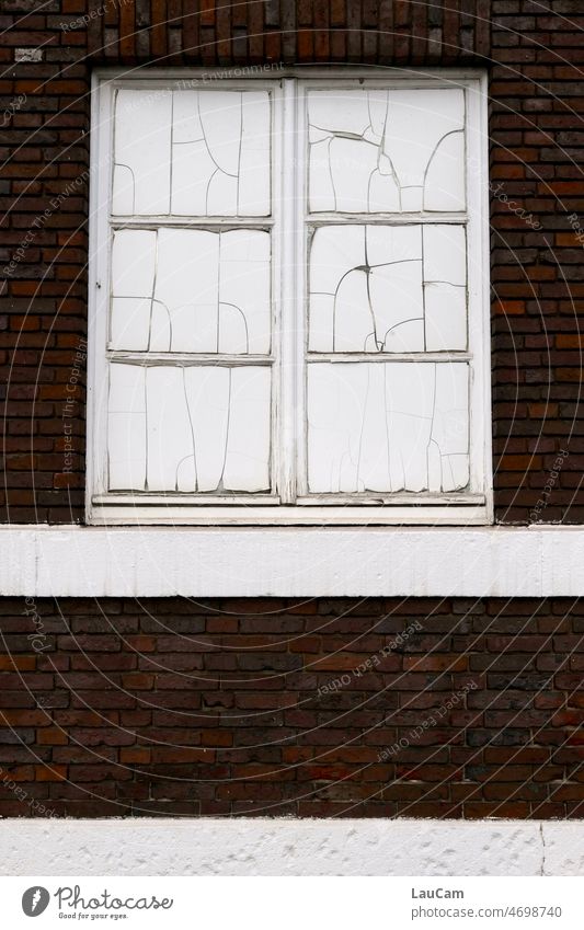 The paint is off - aged and closed Window Weathered cracks clinker facade course of time Closed Structures and shapes Ravages of time Old Change Transience