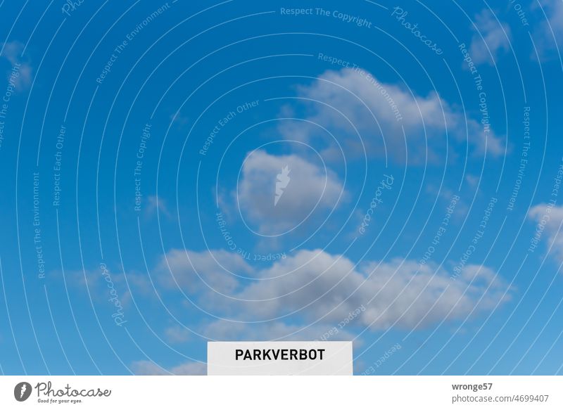 No parking in the sky Clearway Signs Signs and labeling Exterior shot Colour photo Parking Signage Sky Blue sky Pile clouds Clouds Beautiful weather