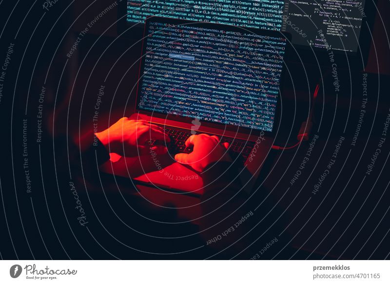 Man using computer and programming  to break code. Cyber security threat. Internet and network security. Stealing private information. Person using technology to steal password and private data