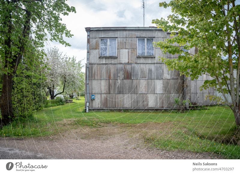 house with asbestos slate walls abstract absurd aged architecture background construction decoration design detail dirty gray grey mailbox material moss