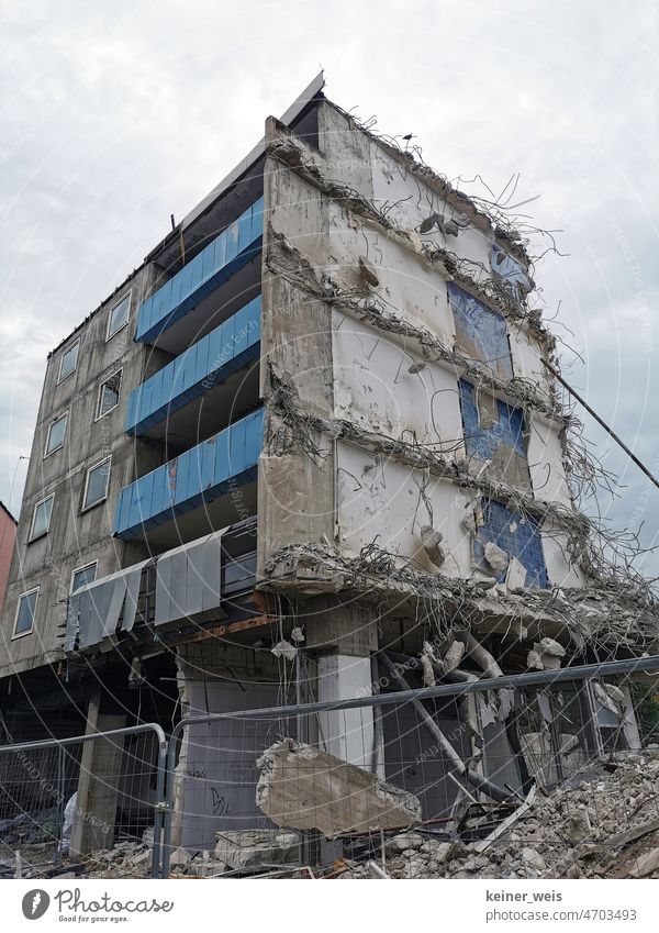 Demolition of a high-rise building. A concrete ruin that no longer exists. Destruction and past in nowhere skyscraper Ruin outline Concrete Deconstruction