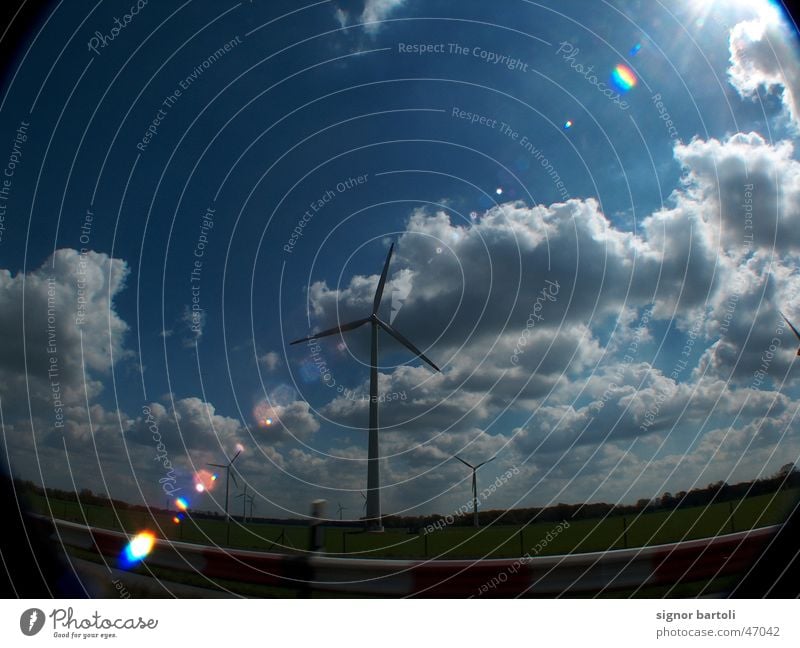 wind farm Fisheye Dazzle Clouds Wind energy plant Sky know Dynamics Blue