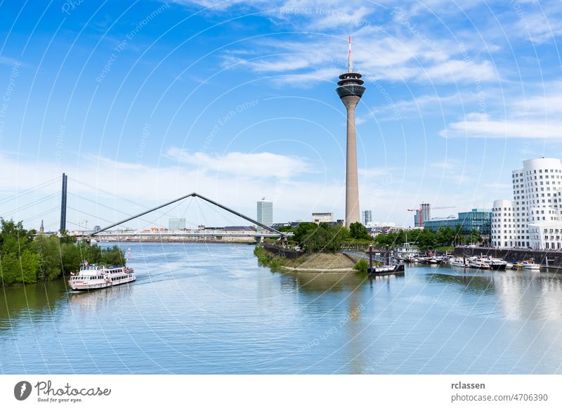 Travel to Dusseldorf in Germanyat summer dusseldorf germany tower river europe city rhine panorama architecture medienhafen harbor media harbor country capital