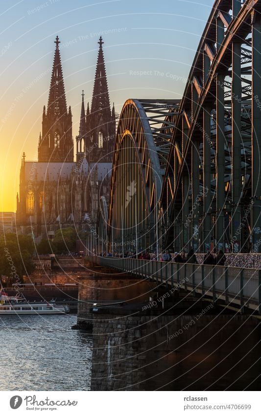 Cathedral of cologne at sunset Cologne city Cologne Cathedral oldtown Rhine Hohenzollern Bridge Germany river church bridge dusk gothik tourism landmarks