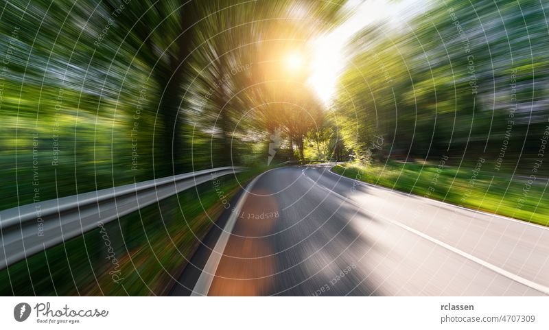 Empty long mountain road to the horizon on a sunny summer day at bright sunset with motion blur, Backplate or Backdrop background. backdrop alpine race alps