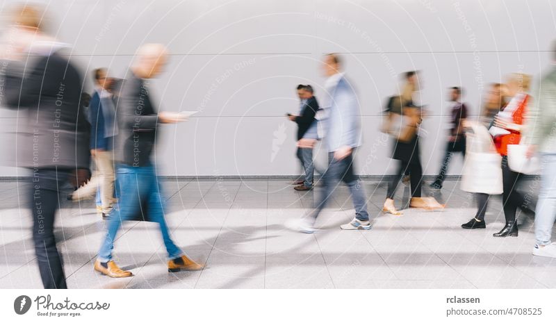 large crowd of anonymous people street london walking group pedestrian rush blur mass concept germany seminar shopping frankfurt architecture blurred business