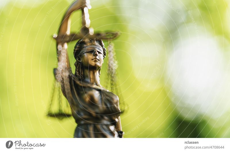 The Statue of Justice - lady justice or Iustitia / Justitia the Roman goddess of Justice law lawyer jail legal statue scale concept courtroom police justitia