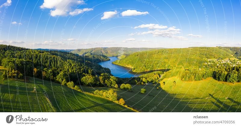 Lake Rursee, Eifel Germany eifel rursee aerial blue drone green sunrise sunset national park nature outside panorama sun flare sunlight reservoir clouds sky