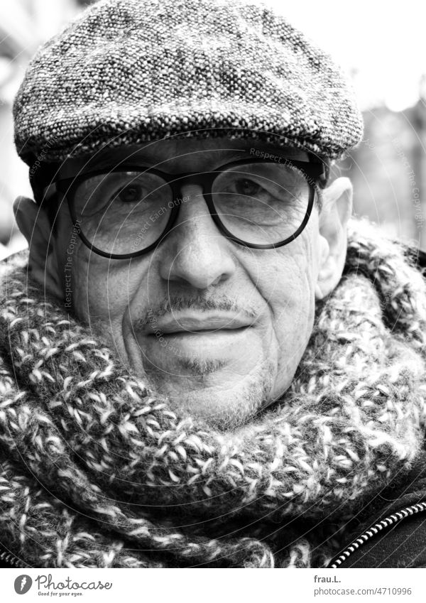 Mild smile Face Smiling Cold Scarf Winter Earnest Sit Man Old portrait Eyeglasses Facial hair cap sliding cap tweet loop