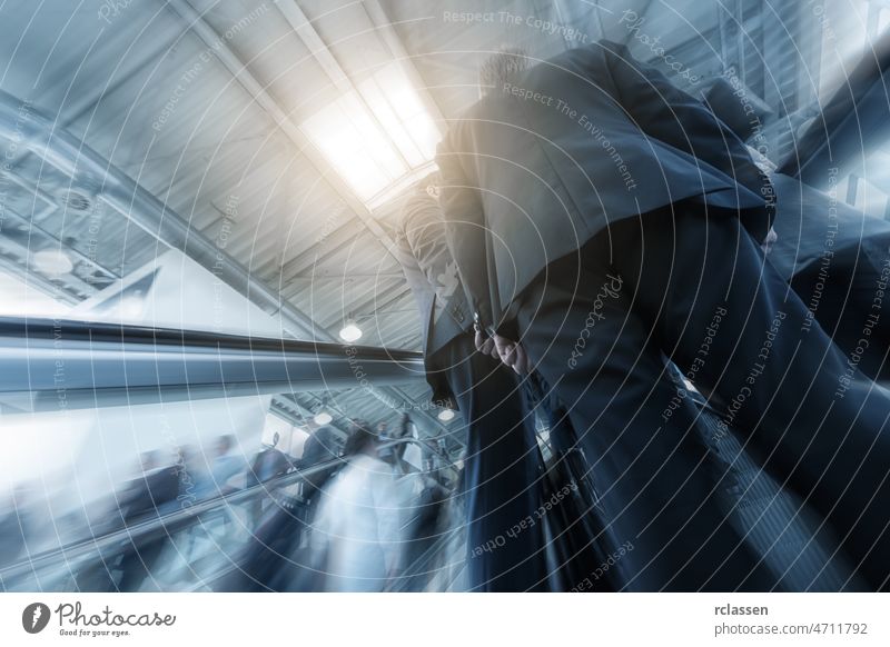 Blurred business people at a escalator architecture visitors moving new york corridor frankfurt trade fair dusseldorf group cologne blur germany Exhibition