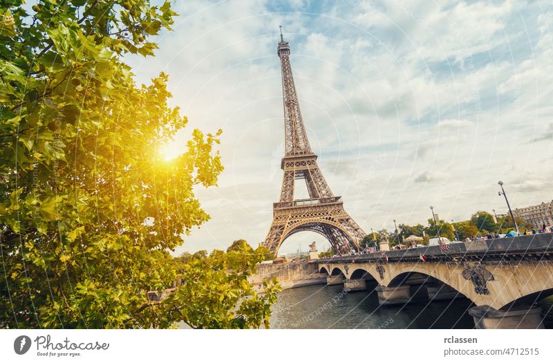 Paris, Eiffel tower at sunrise eiffel skyline paris summer seine view travel romantic river city bridge scene landmark tree water tourism building european