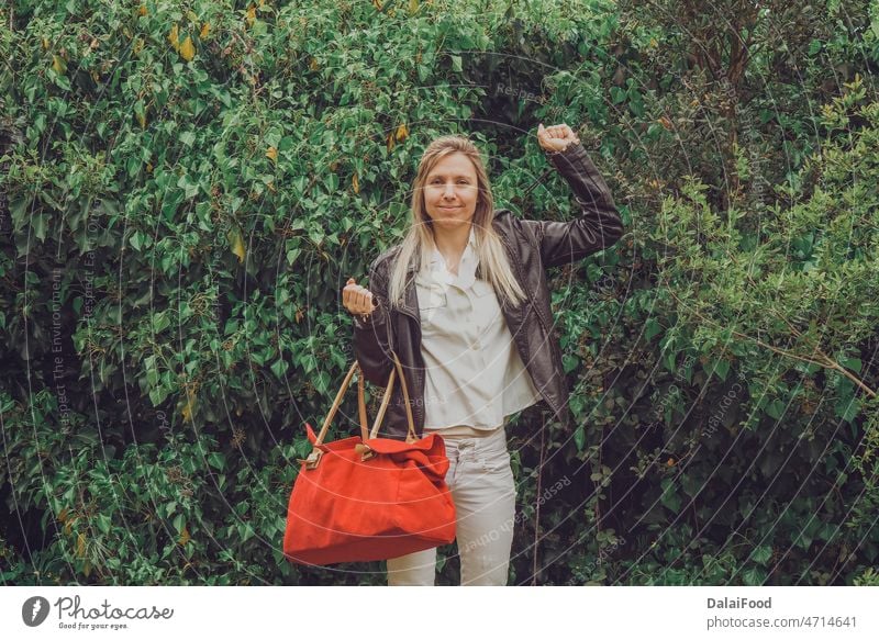 Girl with red suitcase happy for vacation adult adventure attractive background bag beautiful emotion girl grey hiker hiking holiday journey model nature