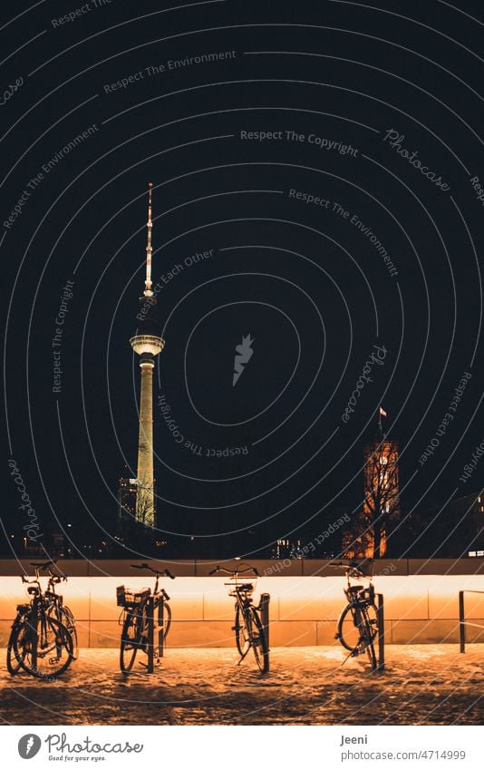 Bicycles against Berlin backdrop Bicycle rack Humboldt Forum Winter Dark Night Alexanderplatz alex Middle Capital city Television tower Berlin TV Tower Landmark