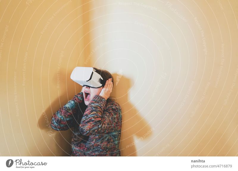 Spontaneous portrait of a young woman using cardboard vr glasses metaverse technology sustainability gamer virtual reality future progress concept surreal