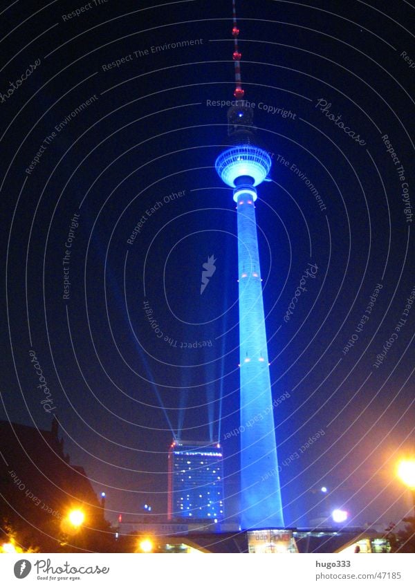 Berlin Alexanderplatz Night Night sky Shine on Light Black Long exposure Illumination Night shot forum hotel blue tower Berlin TV Tower Beam of light Blue