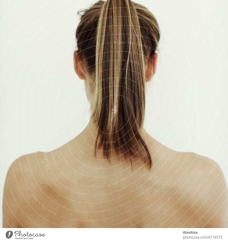 Back portrait of young tall strong woman with long blonde hair tied in braid Woman Large Strong Skin Naked Blonde Long-haired Slim Shoulders Rear view Behind