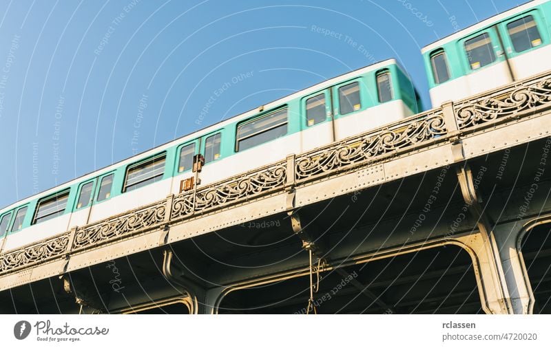 Bir-Hakeim bridge with metro in paris, france eiffel tower landmark train bir-hakeim subway skyline transport public speed traffic cityscape europe old town