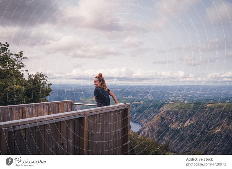 Traveling adult woman admiring view of canyon observe traveler landscape cheerful tourist mountain picturesque admire nature sil canyon female lady spain