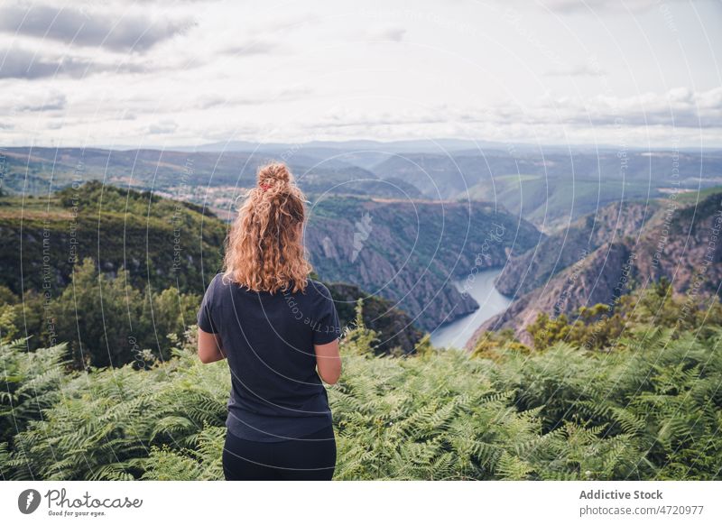 Woman hiker standing and looking at Sil Canyon woman traveler admire canyon observe mountain nature deck amazing female lady adventure viewpoint journey