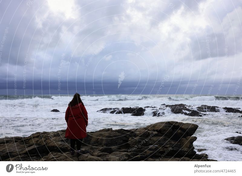 Woman looks to North America Ocean Waves Swell coast White crest Surf Roaring Elements Water Place of longing Longing Horizon Beach Exterior shot Force Wild