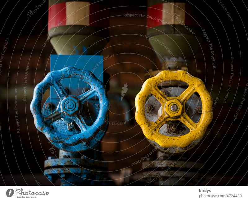 Stopcocks , gate valves for gas or oil pipelines in the national colors of Ukraine blue - yellow Ukraine war Trade embargo Gas Cooking oil Gas supply