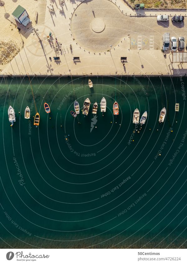 Silent harbor from above Sea water Green Watercraft Navigation coast Boating trip Rowboat UAV view Aerial photograph Downward Fishing boat Exterior shot Ocean