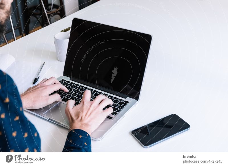 Close up of man hands using laptop home office working young adult worker lifestyles small business businessman desk computer technology business person