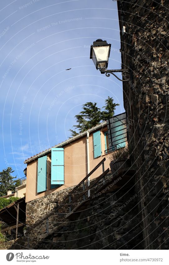 Village life Wall (barrier) House (Residential Structure) streetlamp street lamp sunny Shutter Mountain village Sky Clouds Sunlight open dwell travel