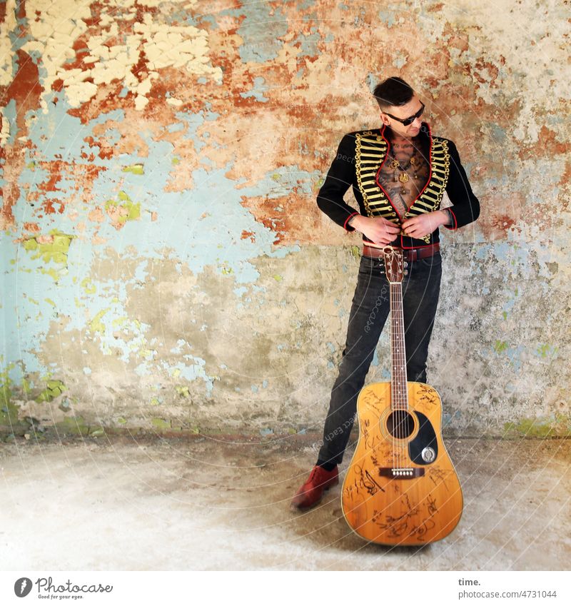 Man with guitar Guitar lost places Wall (building) Jacket Tattoo Short-haired Sunglasses Stand graffiti whole body View to the side