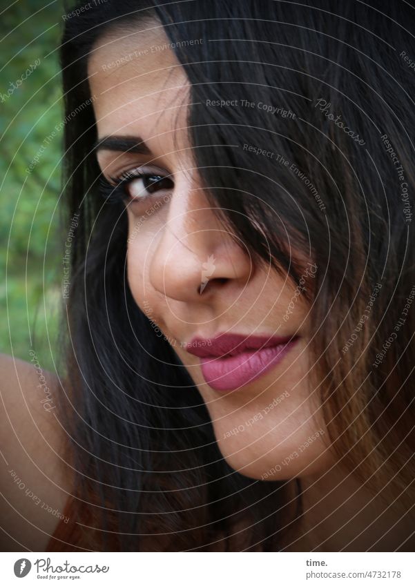 Woman, smart Long-haired Dark-haired Looking Eyes Smiling knowing