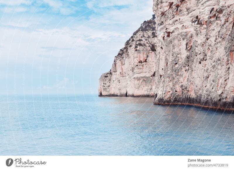 Cliffs by the Ionian sea, Greece. cliffs water landscape Corfu Greek travel boat coastal holiday europe island tourism greece summer mediterranean ionian