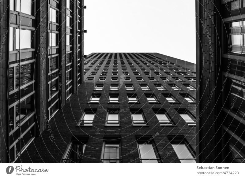 View upwards of a brick facade Building Architecture Monochrome City Stone Wall (building) Sky Construction Tourism Historic Town Old Wide angle background