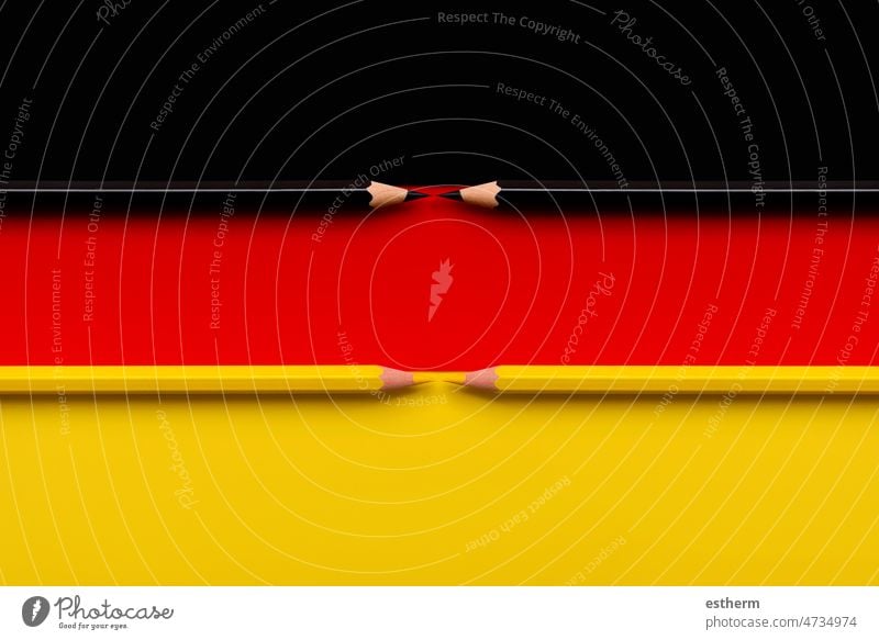 Flag of Germany with yellow and black pencil german flag world state europe abstract sign symbol national color pencils education children germans international