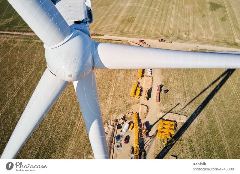 Construction site near windmill turbine, Wind generator installing energy maintenance assembling wind turbine renewable sustainable power innovation build