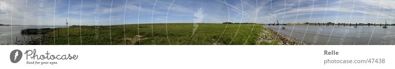 blue-green with sheep Panorama (View) Sailboat Motorboat Drawbridge Sheep Dike Green Meadow Mouth of a river Clouds Coast Ocean Watercraft Animal Tripod