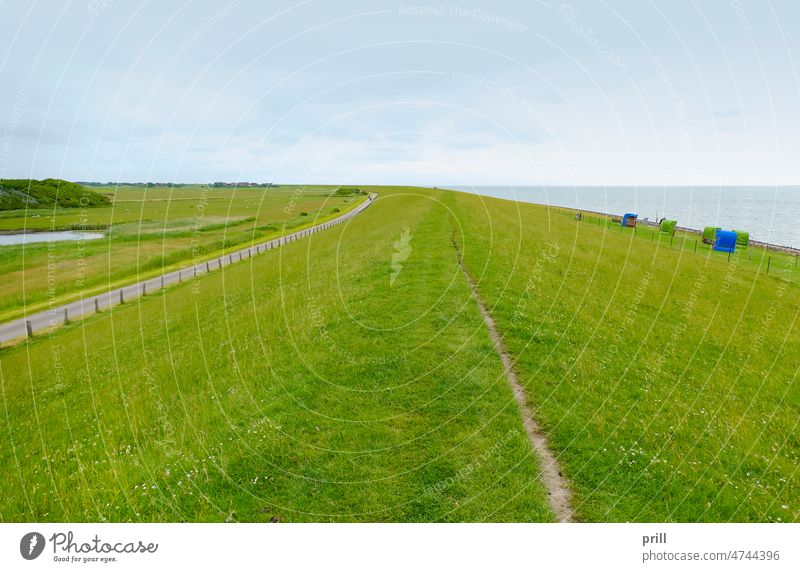 Pellworm at North Frisia pellworm north frisia germany northern germany north sea ocean dike dyke beach chair overgrown sheep farmland coastal way