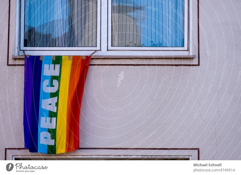 Peace: flag on a residential building peace peaceful Flags Ukraine Russia War Ukraine war Russia-Ukraine war Peace Wish rainbow flag Solidarity Sign Hope