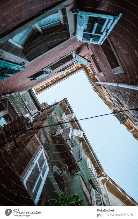 #A0# Alley with red lanes gaseous muck romance of the streets popular piran Slovenia Mediterranean angled Skyward