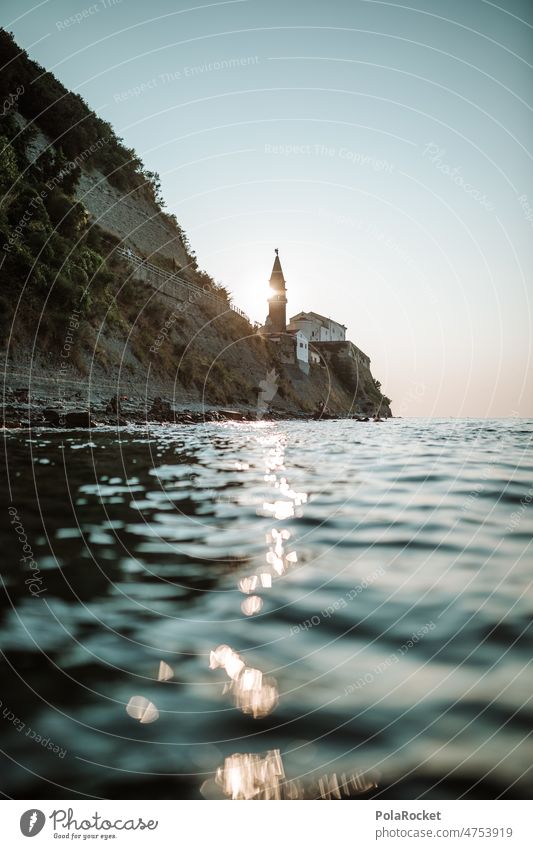 #A0# Piran sun piran Slovenia Ocean coast Church Church spire Sunset Colour photo Exterior shot Vacation & Travel Water Sea water Sky Summer