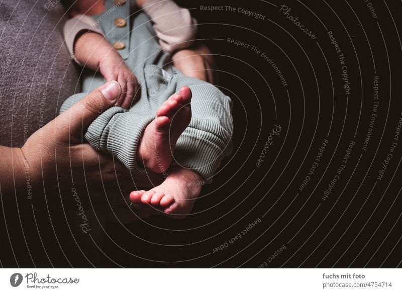 Baby feet and mommy hands Child Toddler Hand Birth Lie Cute Human being Fingers Happy Barefoot 0 - 12 months Feet Small Safety (feeling of) Interior shot