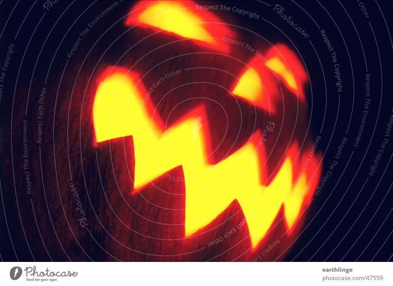 Hello Ween! Hallowe'en Candle Frightening Dark Low-cut Hollow Zigzag Opening Motion blur Landscape format A light in the dark Close-up Analog Creepy Pumpkin